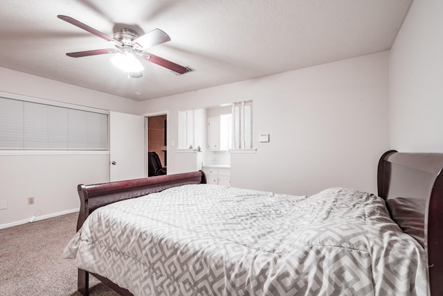 bedroom with ceiling fan and carpet