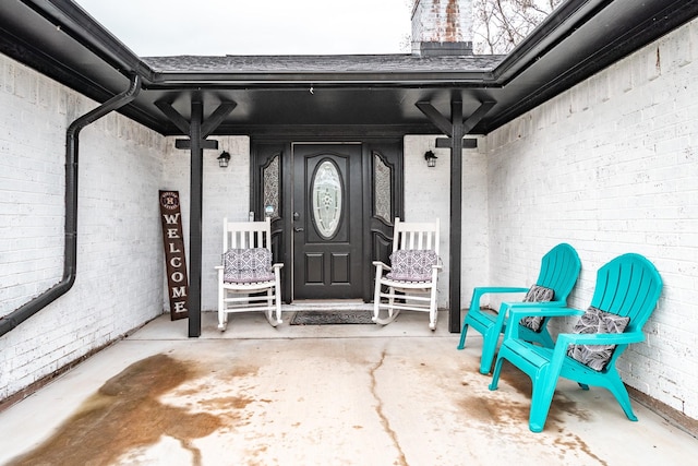 entrance to property with covered porch