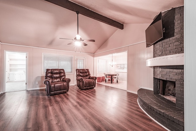 living room with a fireplace, vaulted ceiling with beams, ceiling fan, and dark wood-type flooring