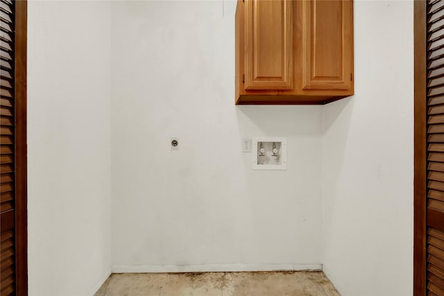 clothes washing area with hookup for an electric dryer, cabinets, and hookup for a washing machine