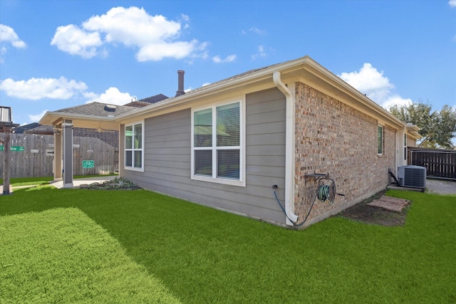 view of property exterior featuring cooling unit and a lawn