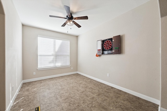 unfurnished room with ceiling fan