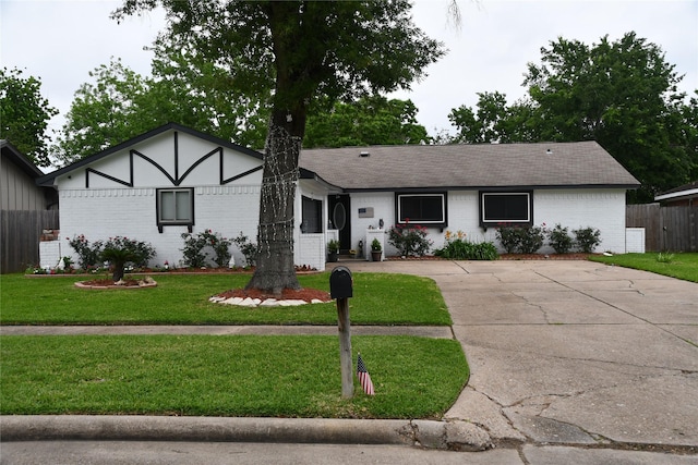 view of front of home with a front yard