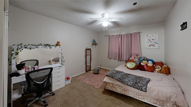 carpeted bedroom featuring a textured ceiling and ceiling fan