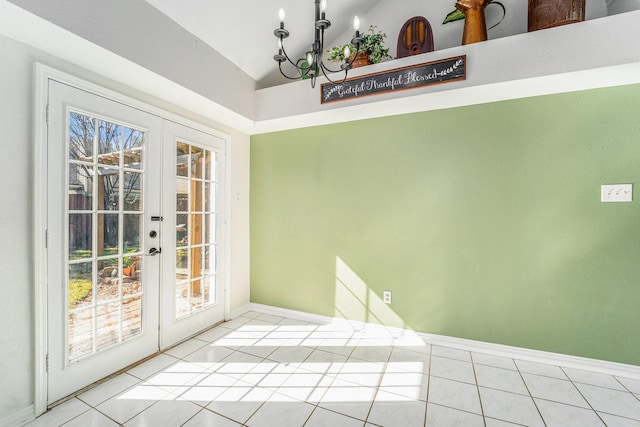 doorway featuring light tile patterned flooring, lofted ceiling, an inviting chandelier, and french doors