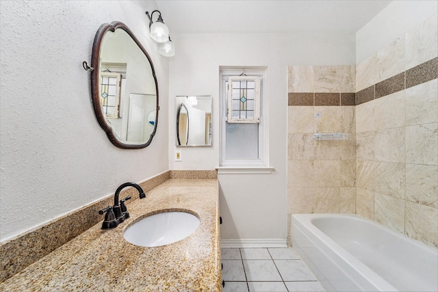 bathroom with tile patterned flooring, vanity, and shower / tub combination