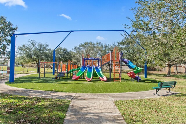 view of play area with a yard