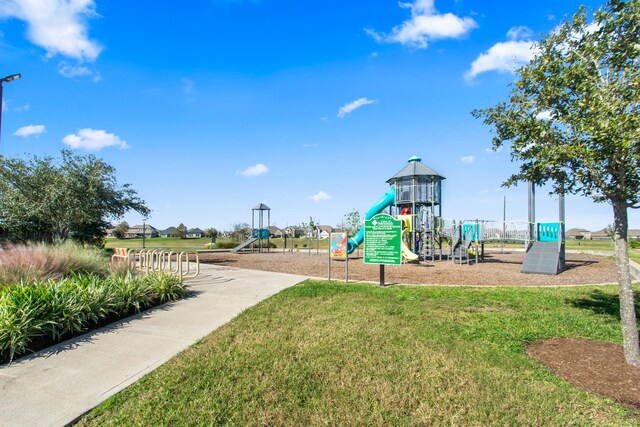 view of jungle gym with a yard