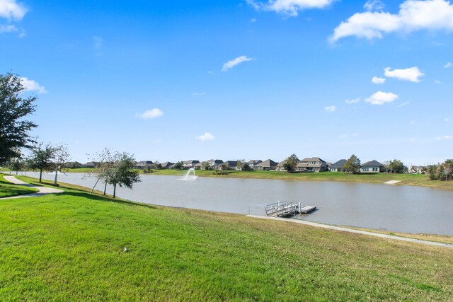 property view of water with a boat dock