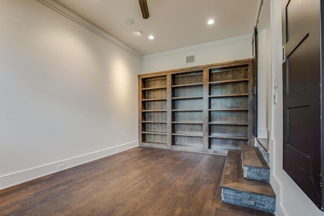 interior space featuring dark hardwood / wood-style flooring and crown molding