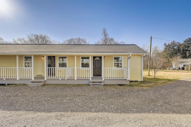 single story home with covered porch