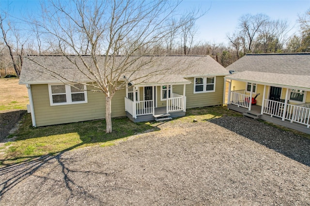 single story home featuring a porch