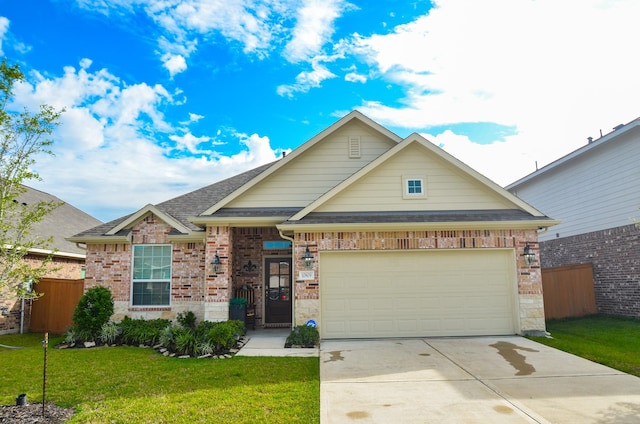 craftsman-style home featuring a front yard and a garage