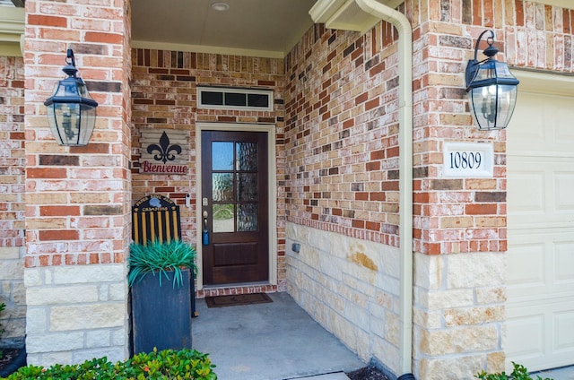 property entrance with a garage