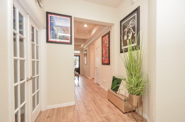 hallway featuring light hardwood / wood-style flooring