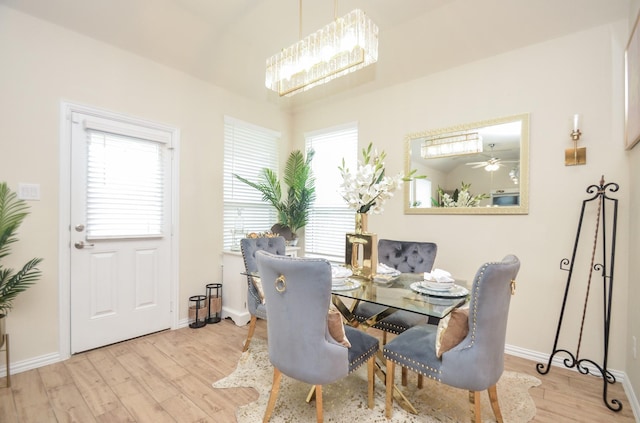 dining space featuring light hardwood / wood-style flooring and ceiling fan