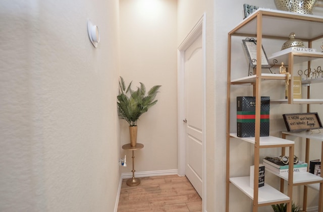 corridor featuring light hardwood / wood-style flooring