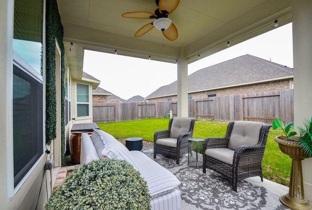 view of patio with ceiling fan