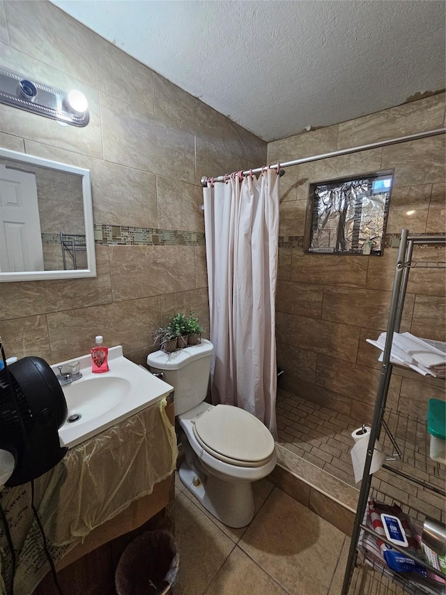 bathroom with walk in shower, a textured ceiling, sink, tile patterned flooring, and toilet