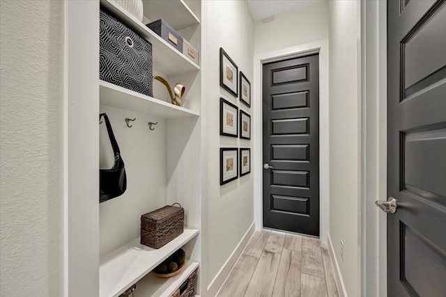 mudroom featuring light hardwood / wood-style floors