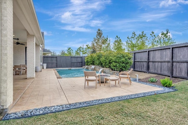 view of pool featuring a patio and ceiling fan