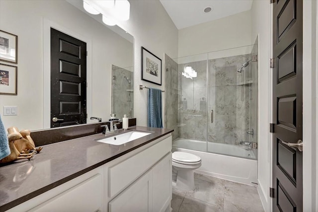 full bathroom with vanity, enclosed tub / shower combo, and toilet