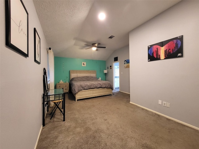 bedroom featuring carpet, ceiling fan, lofted ceiling, and a textured ceiling