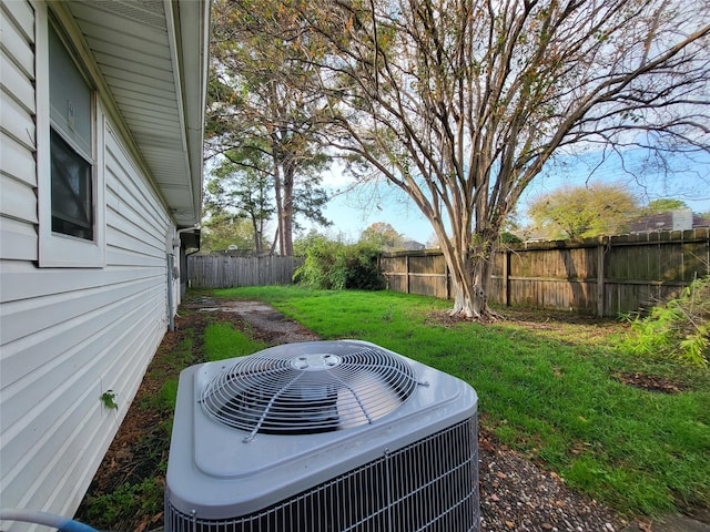 view of yard with central AC