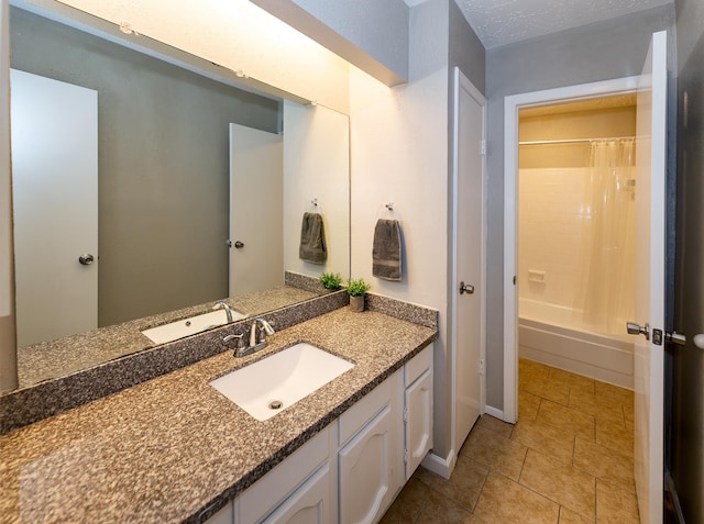 bathroom featuring vanity and shower / bath combo with shower curtain