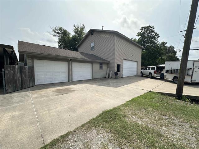 view of home's exterior with a garage