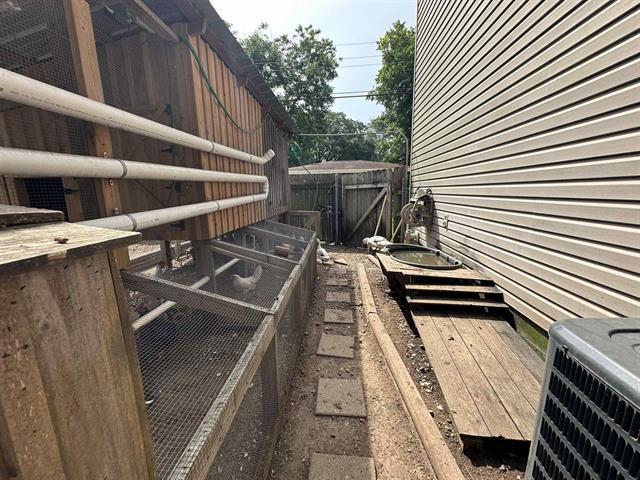 wooden terrace featuring central AC