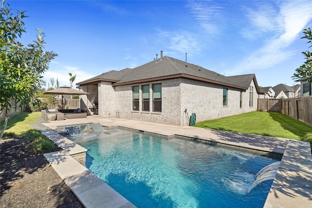 view of pool with a patio area and a yard