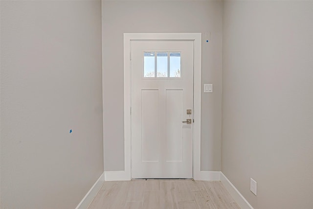 entryway with light hardwood / wood-style floors