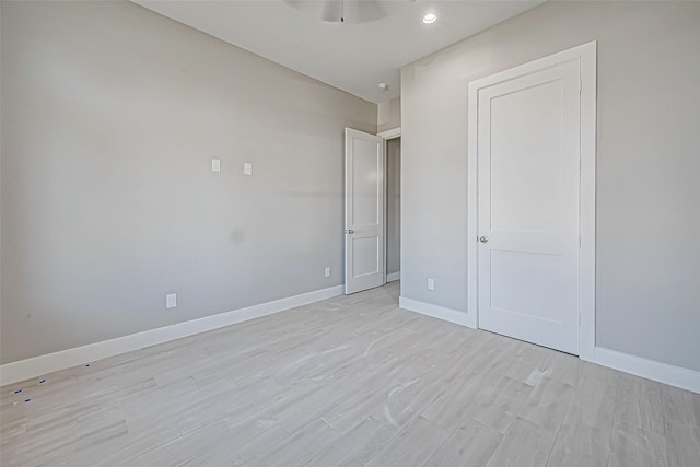 unfurnished bedroom featuring light wood-type flooring