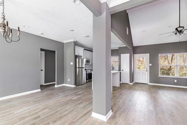 foyer with light hardwood / wood-style flooring and ceiling fan