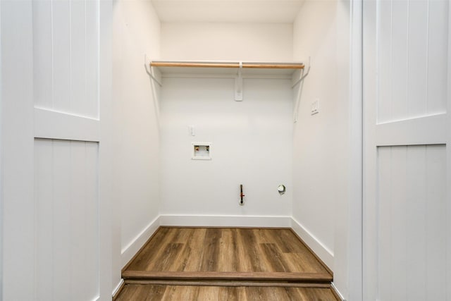 laundry room with gas dryer hookup, washer hookup, and wood-type flooring