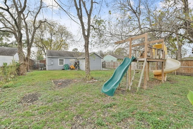 view of jungle gym featuring a lawn