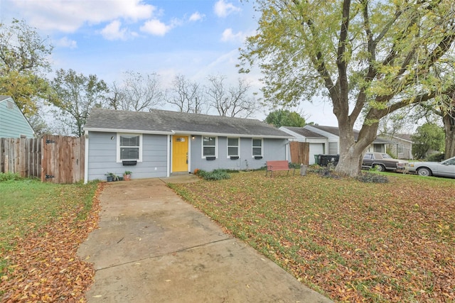 ranch-style house with a front lawn