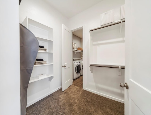 laundry room with dark colored carpet and independent washer and dryer