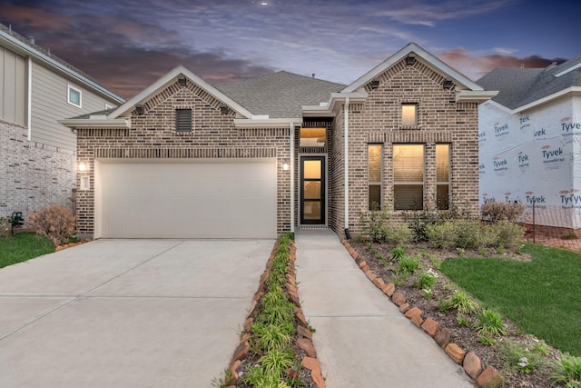 front facade with a garage