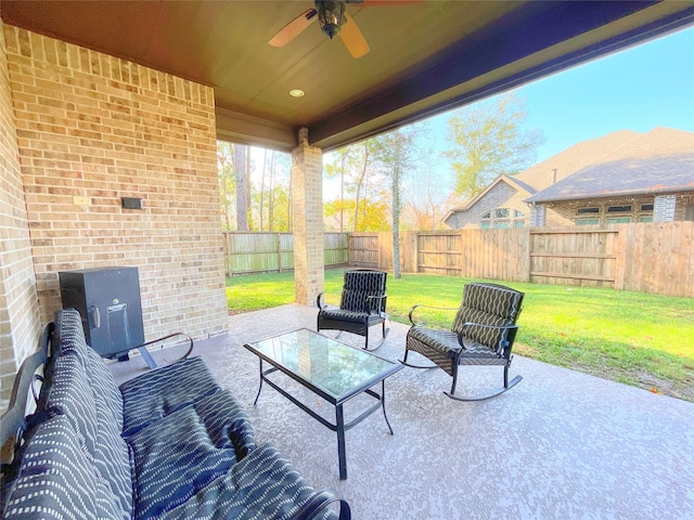 view of patio featuring ceiling fan and an outdoor living space