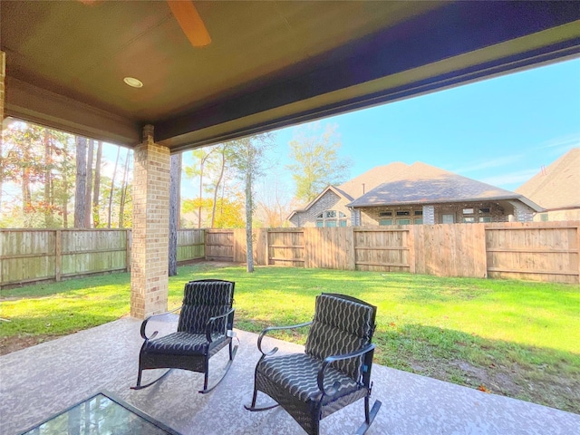 view of patio / terrace featuring ceiling fan