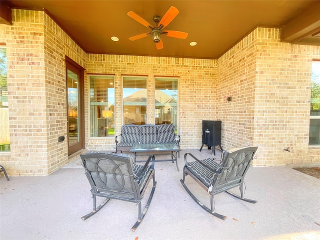 view of patio featuring ceiling fan and an outdoor hangout area