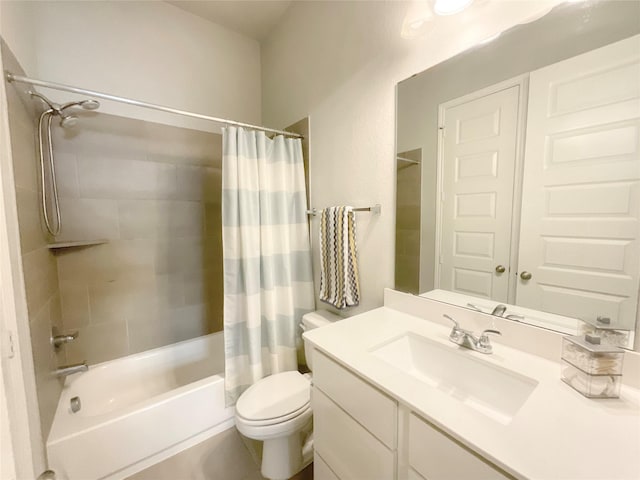 full bathroom with vanity, shower / bath combo, and toilet