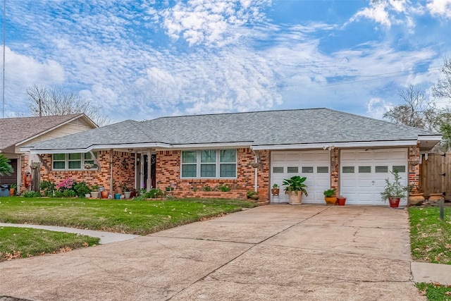 single story home featuring a front yard and a garage