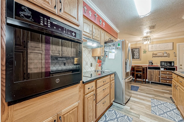 kitchen featuring crown molding, black appliances, a textured ceiling, and light wood-type flooring