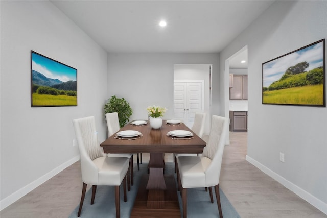 dining room featuring light hardwood / wood-style floors