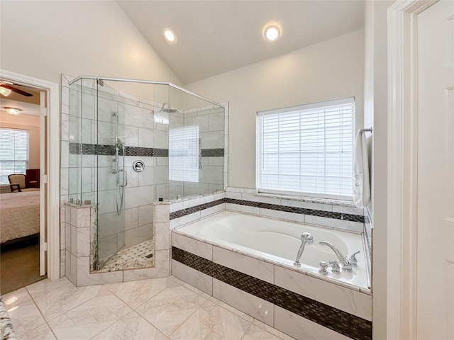 bathroom with vaulted ceiling and independent shower and bath