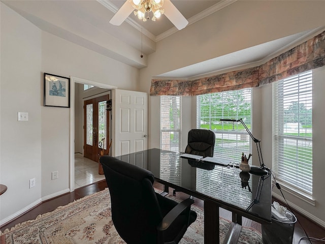 office area featuring hardwood / wood-style floors, ceiling fan, crown molding, and french doors