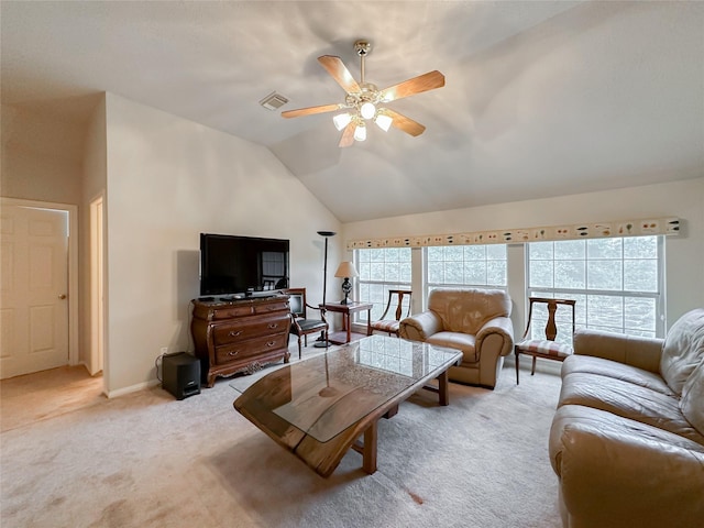 living room featuring ceiling fan, light colored carpet, and vaulted ceiling